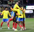 Davinson Sánchez, de Colombia, celebra con sus compañeros el tercer gol del equipo durante el partido amistoso internacional entre Colombia y Australia en el Citi Field em vísperas del Mundial 2026.