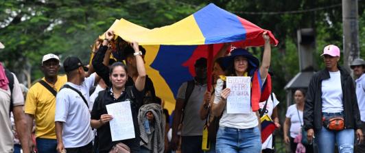 Marchas de 23 de noviembre. / Foto: AFP.