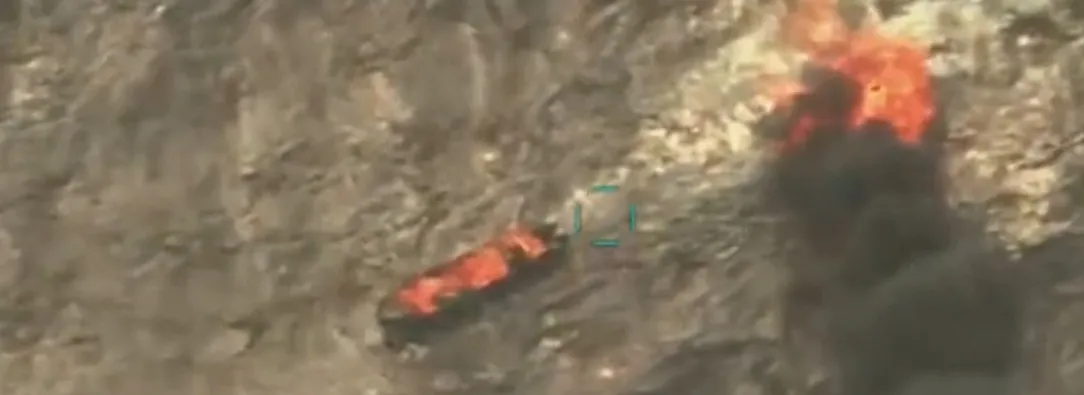 This screen grab from a video posted by US President Donald Trump on his Truth Social account on September 15, 2025, shows what President Trump says is US Military forces conducting a strike on a boat carrying alleged drug traffickers in the Caribbean Sea in the SOUTHCOM area of responsibility