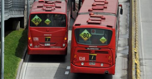 Hombre asesinado en Transmilenio. / Foto: AFP.